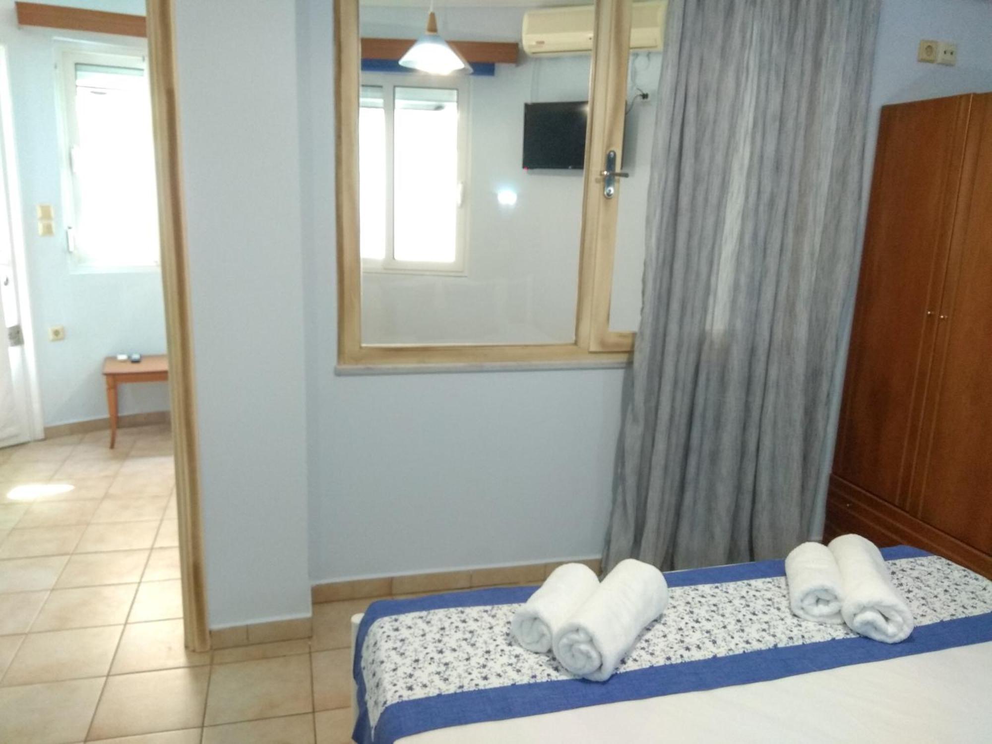 Ellinas Hotel Khrysi Ammoudia Rom bilde